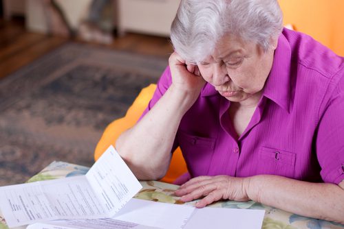 older lady reviewing documents
