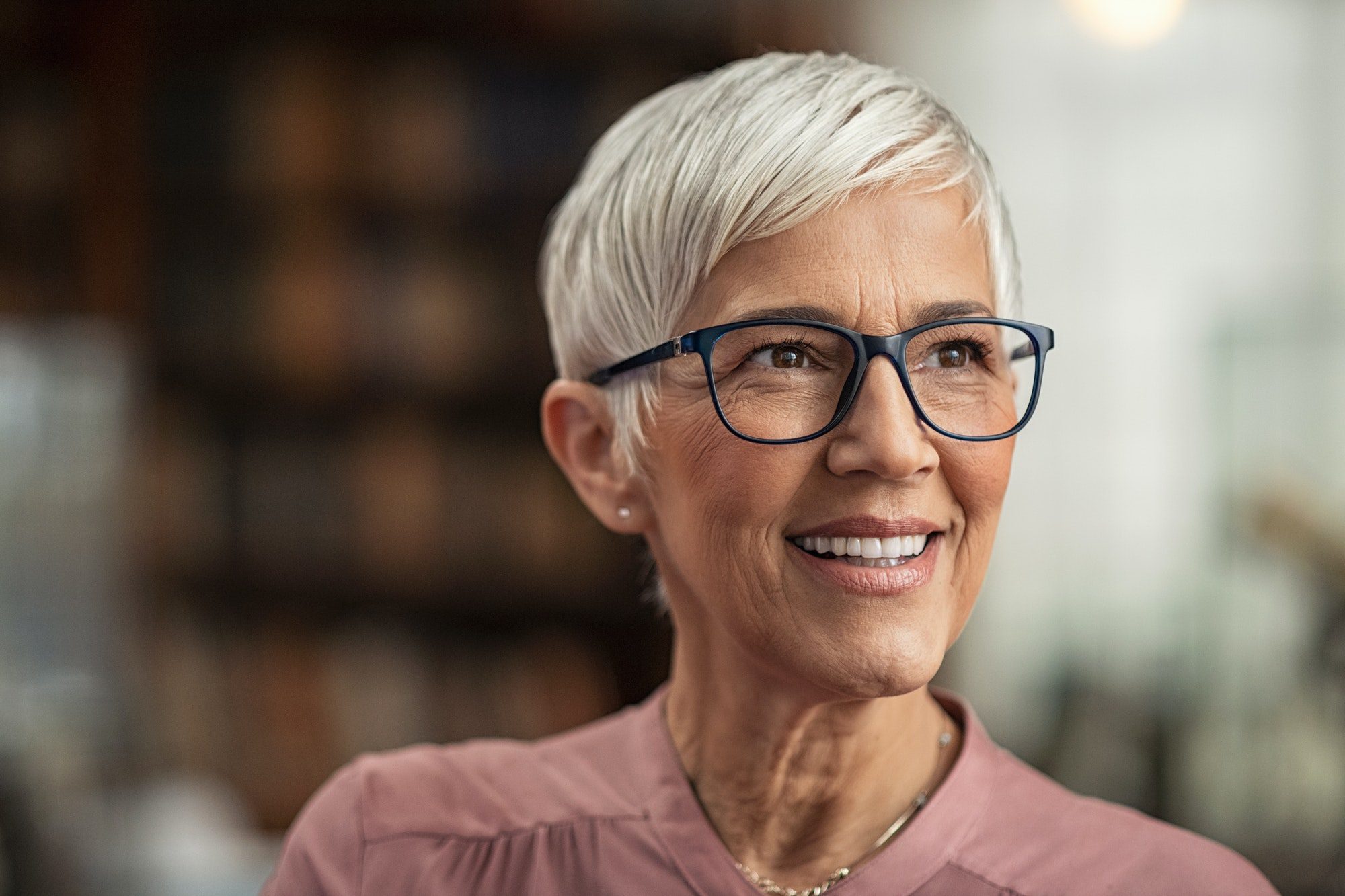 Senior woman smiling with eyeglasses on her Vision Benefits